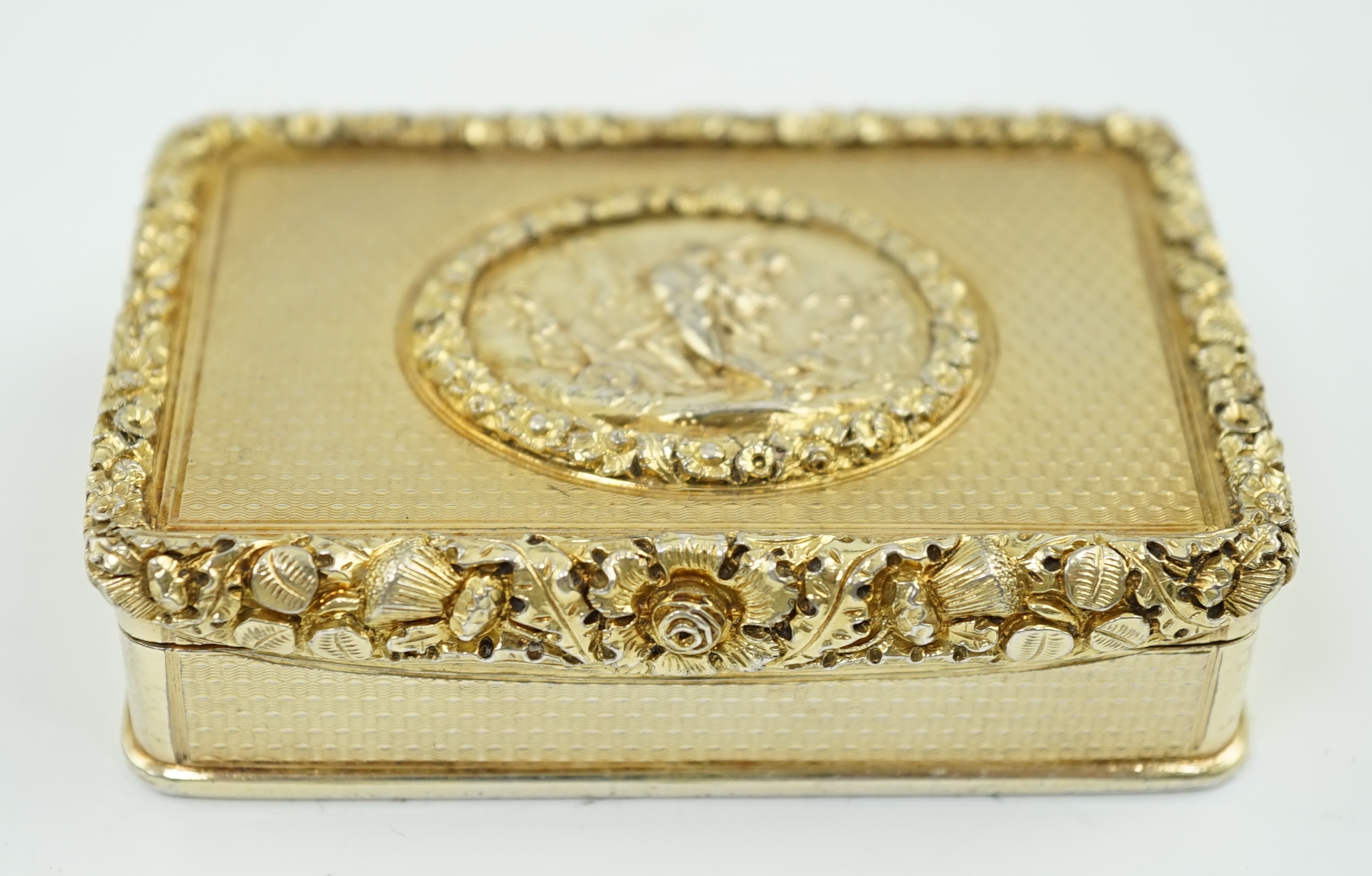 A late George III engine turned silver gilt rectangular snuff box, by William Snooke Hall